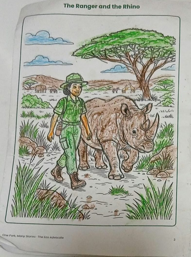 A child's drawing of a ranger walking with a rhino